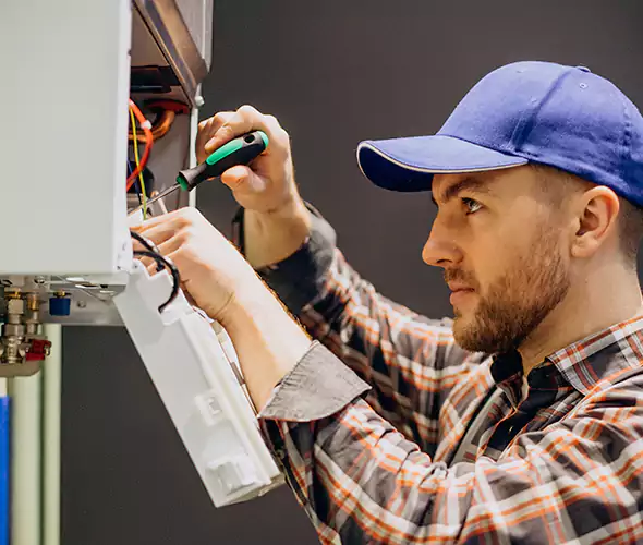 Expert Plumber for Tankless Water Heater Maintenance in Hauppauge, NY: Schedule Professional Maintenance Services with Us